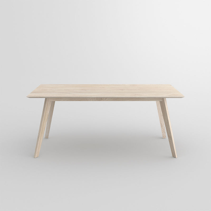 citie oak dining table side view with a white oil finish