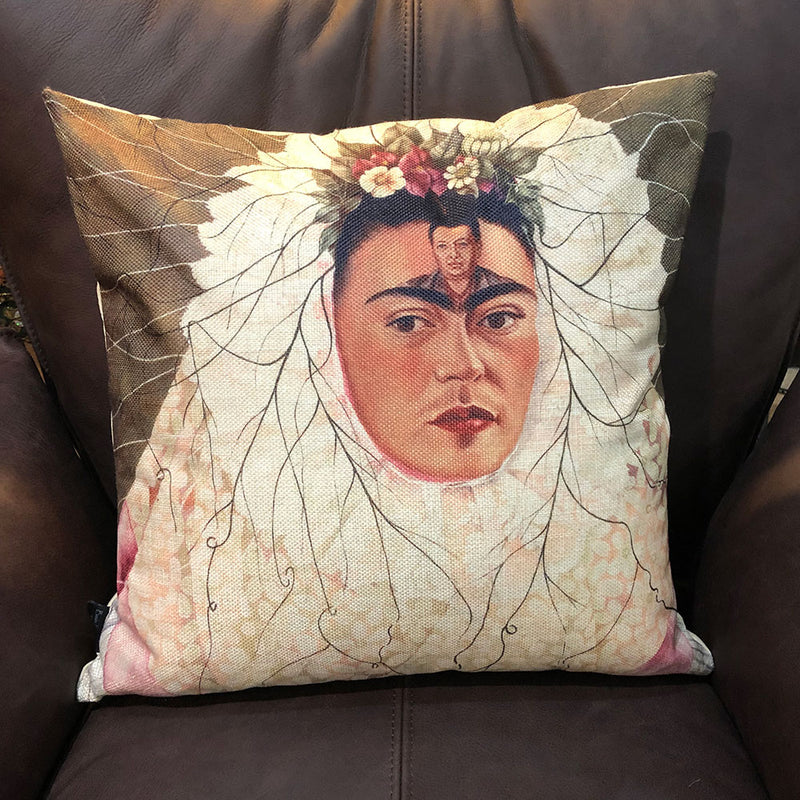 Cushion with image of Frida Kahlo + image of husband diego 