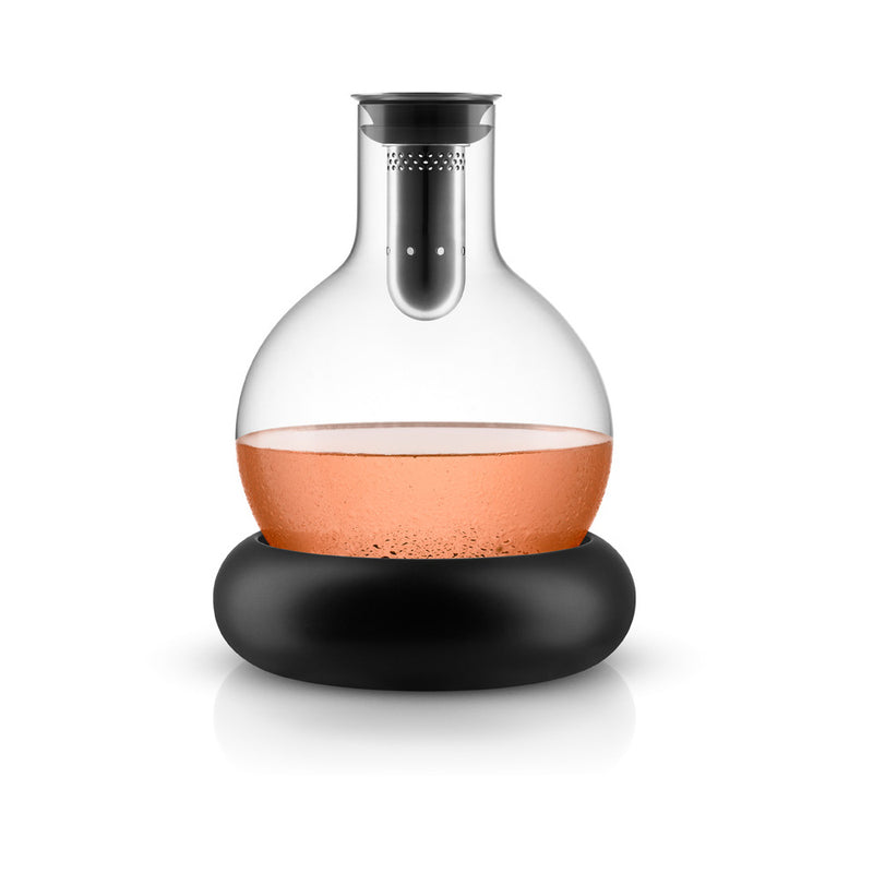 Cool decanter shown with rosè wine in an alfresco setting