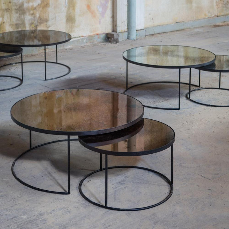 glass topped nesting round tables shown in all colorways