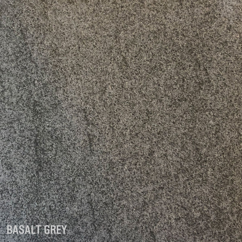 colour sample of the BASALT GREY ceramic colour. Mottled grey tones.