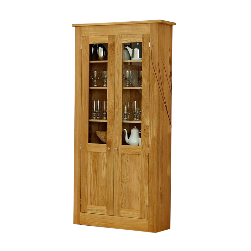 Oak display cabinet with glasses on display