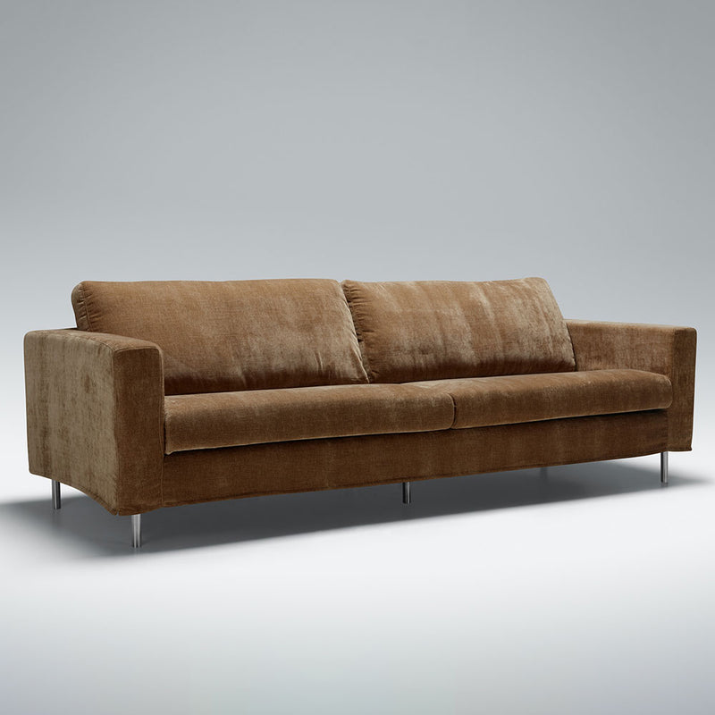 anders sofa with wide arm option on chrome metal legs in wildflower fabric, teddy brown.