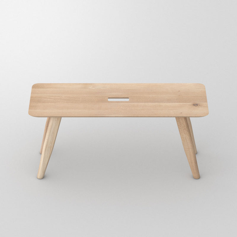 Oak - in light oil- atlas bench, angled legs with a hand hole in centre for moving around.