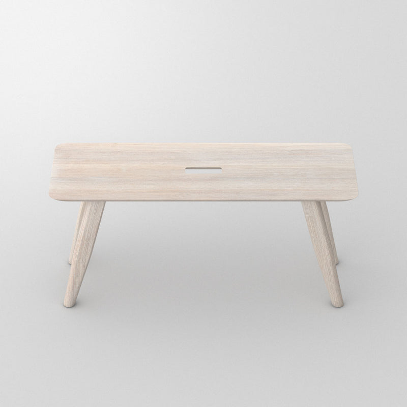 Oak - in white oil- atlas bench, angled legs with a hand hole in centre for moving around.