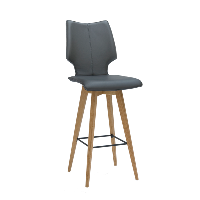 Bar stool with grey leather seat and oak legs; black metal foot rest