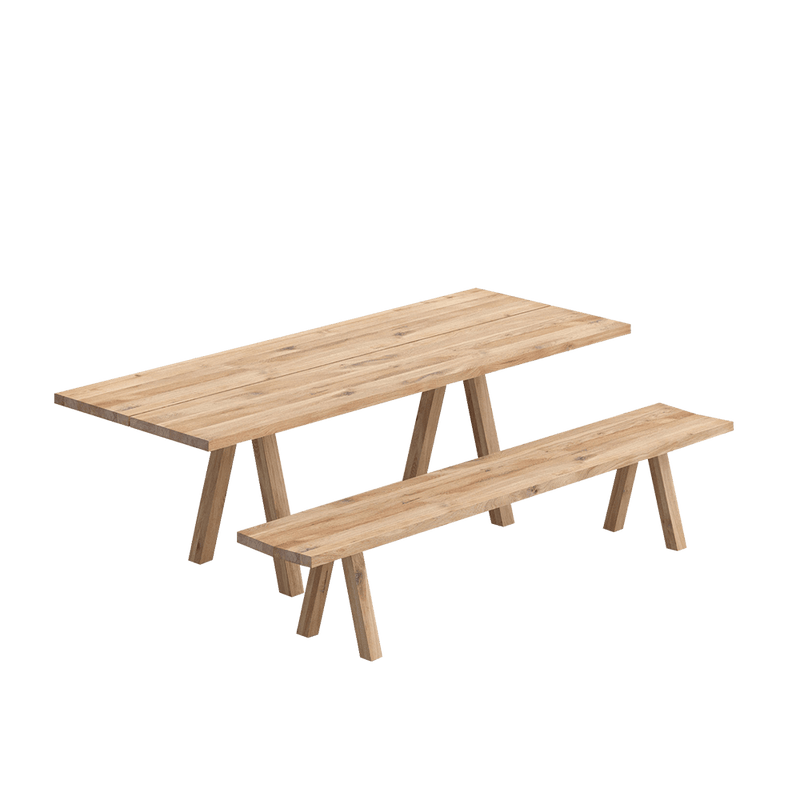 Facile dining table in oak with accompanying bench, trestle style legs