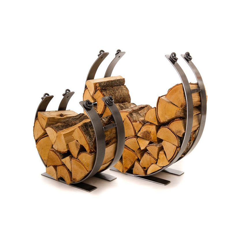 circle log holders, forged steel shown in both sizes stacked with firewood.