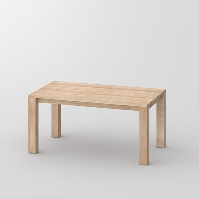 journeyman dining table in light oak,  four corner legs, simple top.