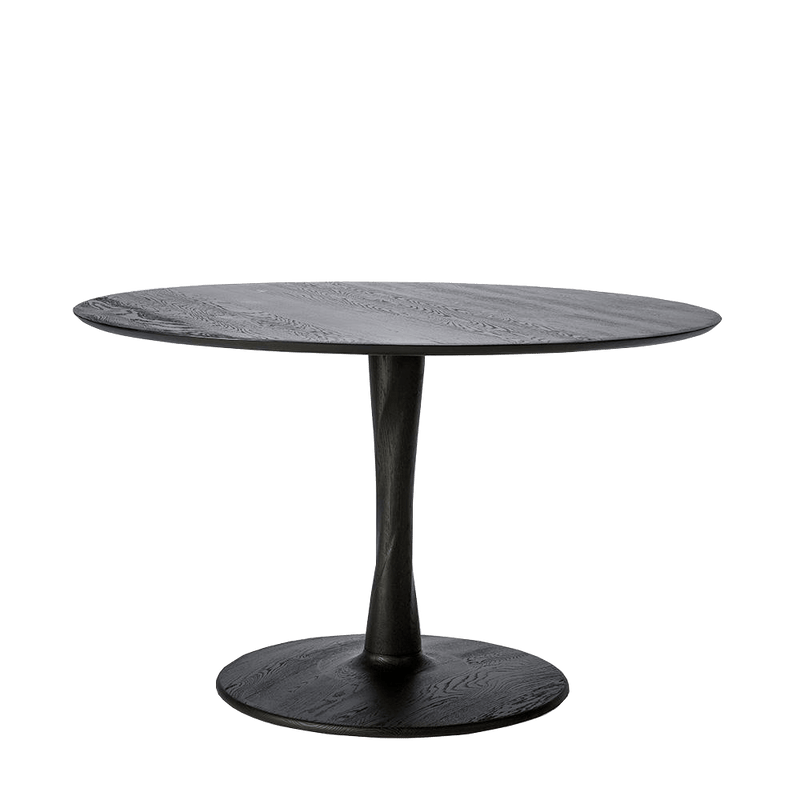 Black round dining table with tapered leg