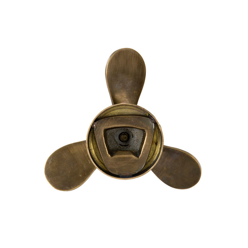 brass set of propellors shaped bottle opener ( remover in rear of propellor)