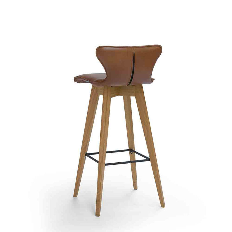 L1 barstool with oak legs and black footrest, leather seat shown in brown, shown from back