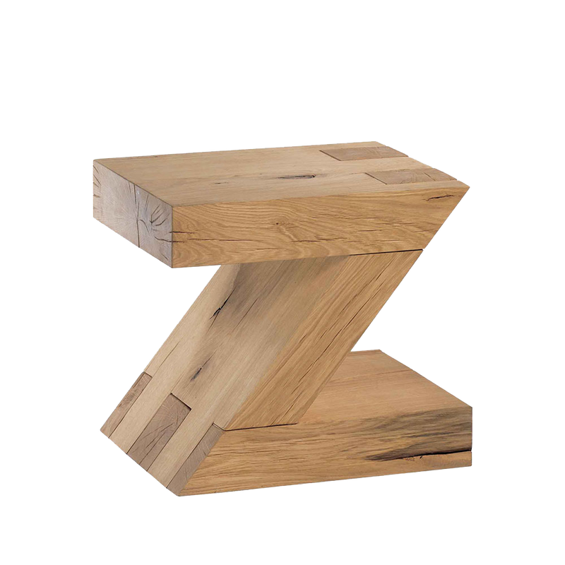 solid oak stool or table in the shape of a Z, showing knots, cracks and grain of the wood.
