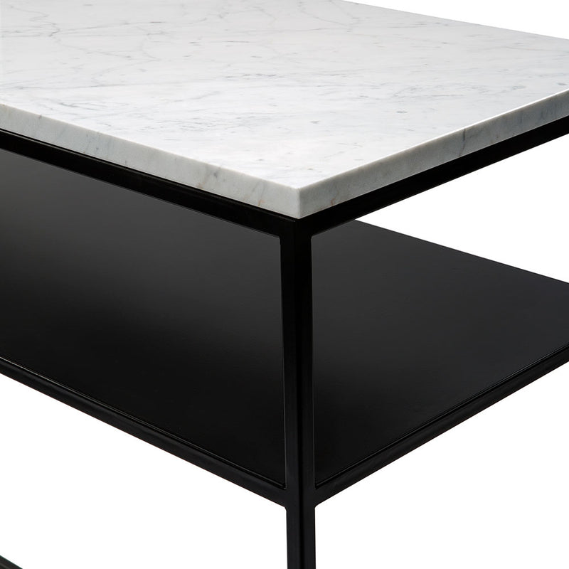 stone white marble top console table with black frame and shelf. detail of corner. stone right to the edge.
