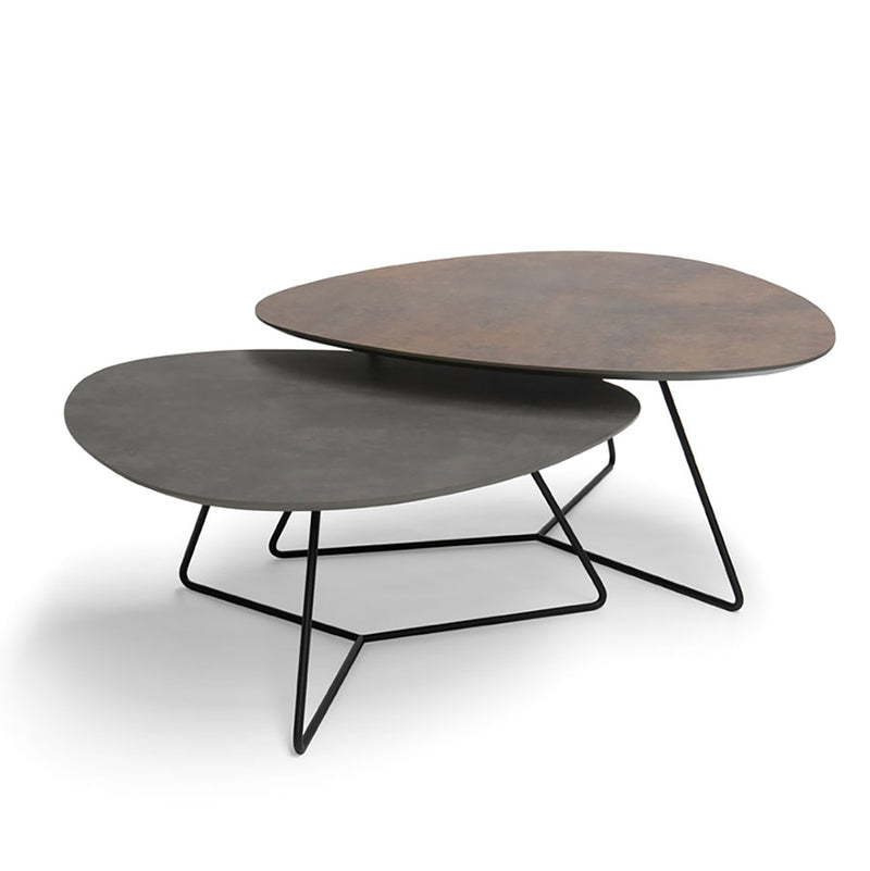 studio picture of coffee tables with bronze and grey tops and black metal legs