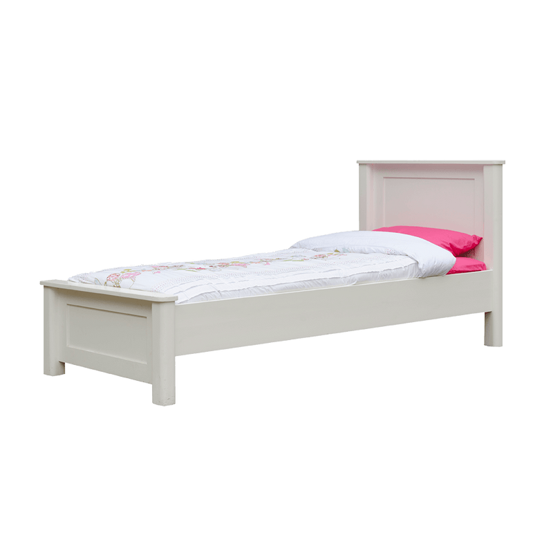 White painted solid wood single bed with pink cushion and white bedspread