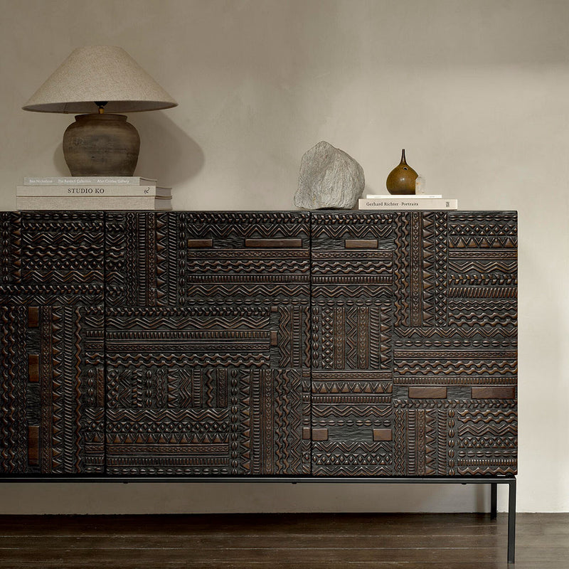 Ethnicraft Tabwa sideboard with lamp and books on top