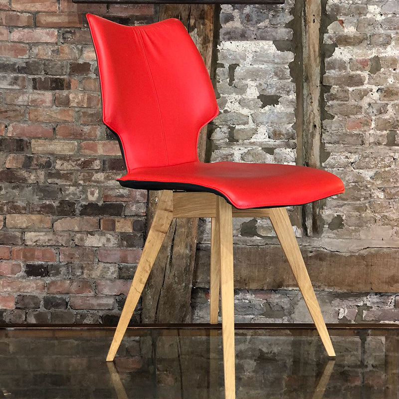 c1 chair with oak angled legs and red leather seat