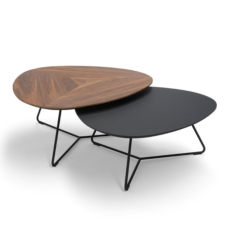 studio shot of pebble walnut and black fenix coffee tables