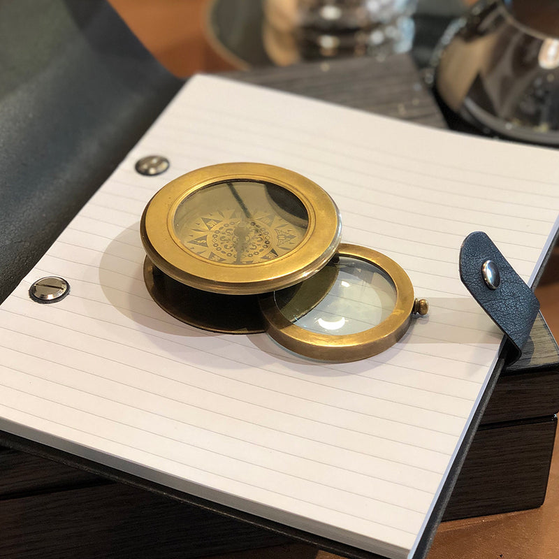 Compass with Hidden Magnifier
