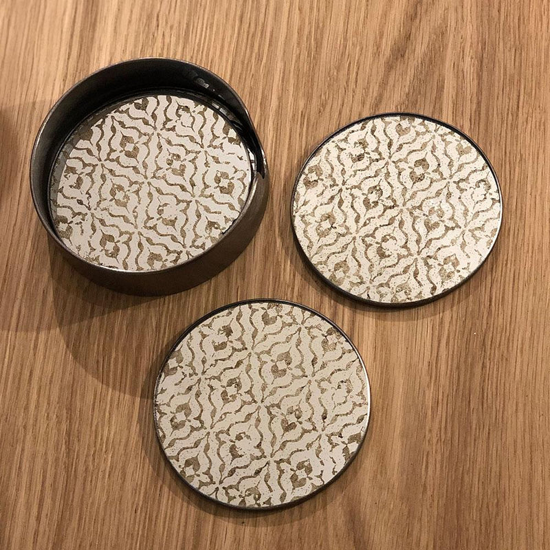 Diamond print mirror coasters. set of four round coasters in tabletop holder
