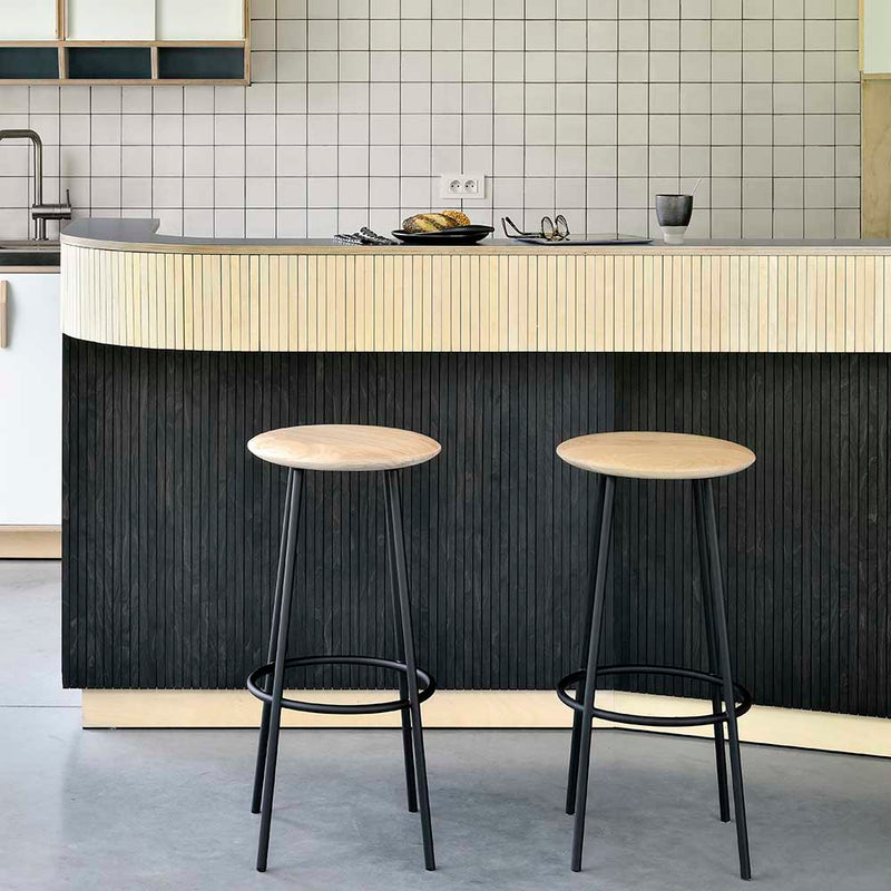 Lifestyle picture of the barretto stool at a kitchen counter