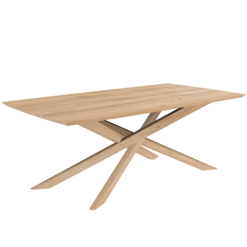 elements solid oak dining table with crossed  legs, angle view