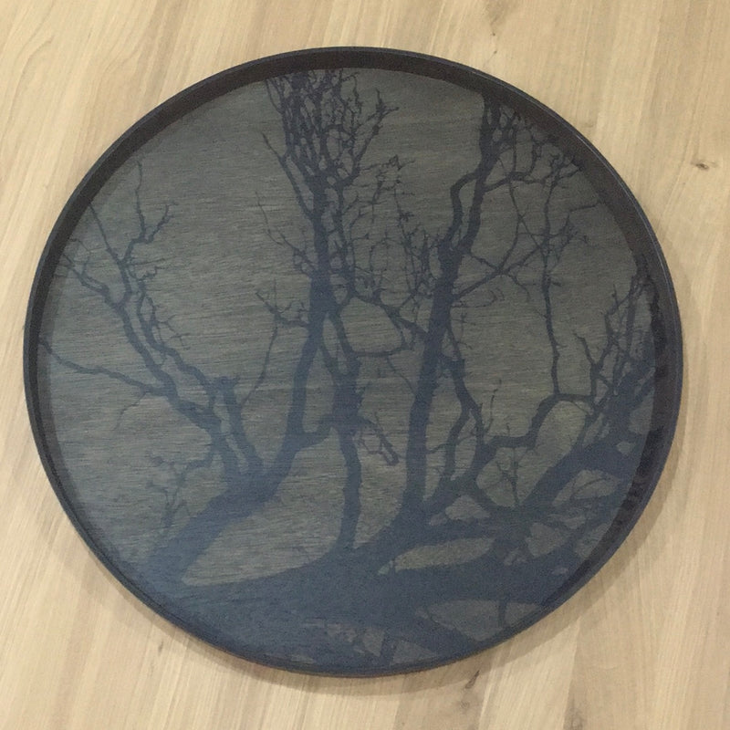 wood tray, with black tree on dark background, printed onto bottom of tray. black base