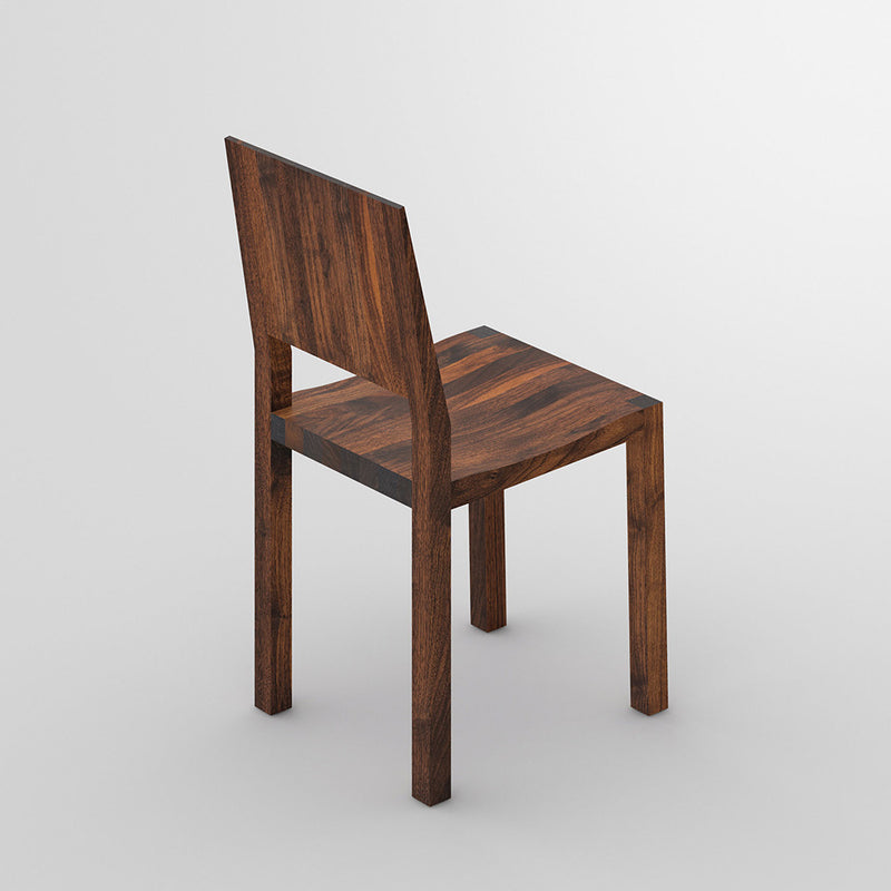 rear view of the zack chair in walnut and finished in oil